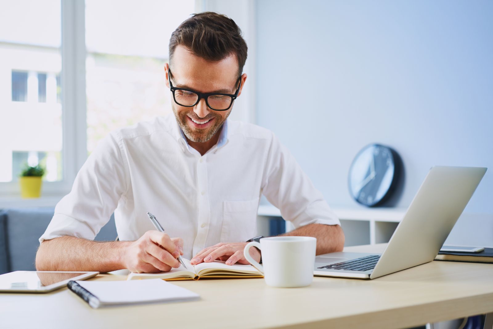 man whiteshirt writing