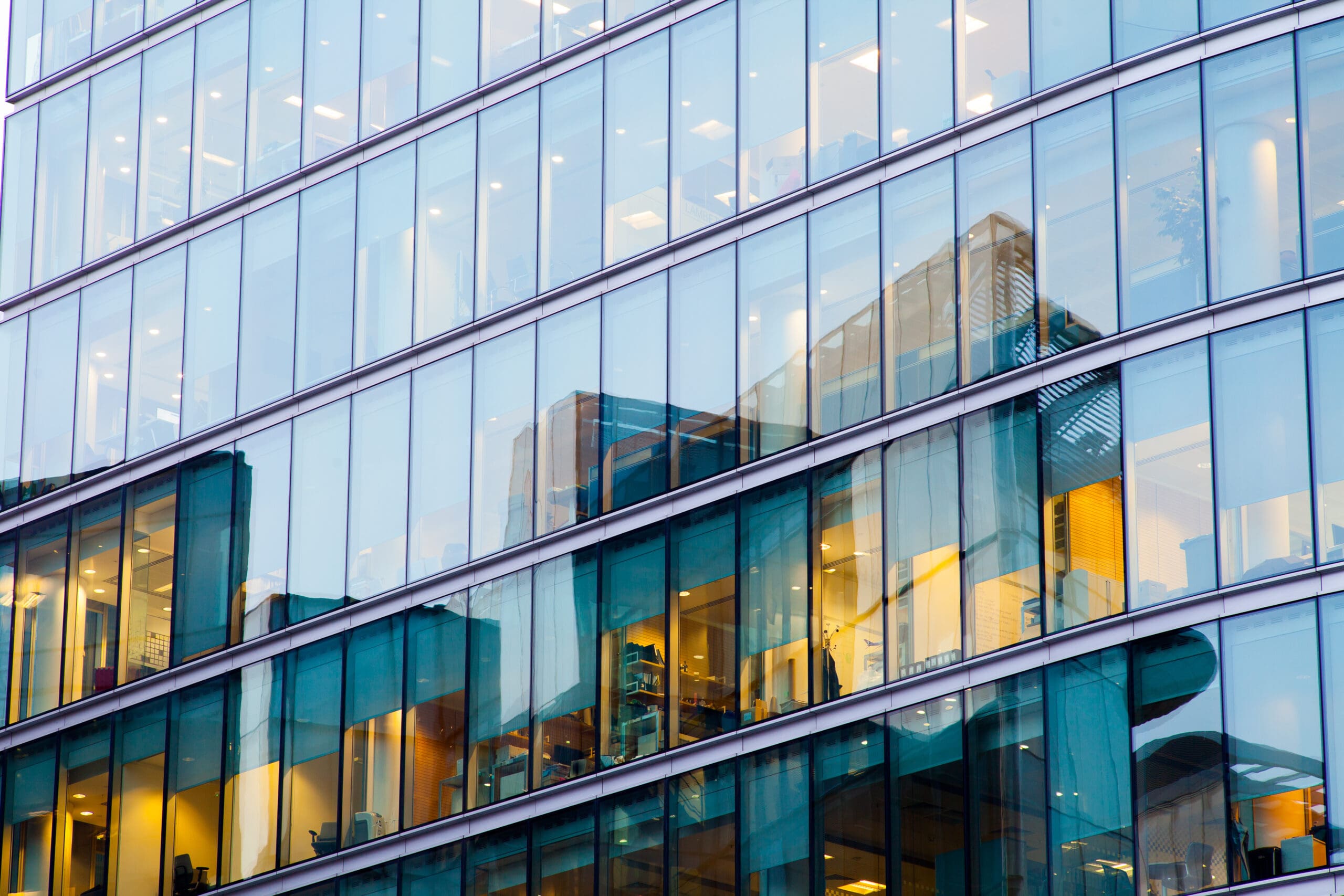glass city windows building scaled