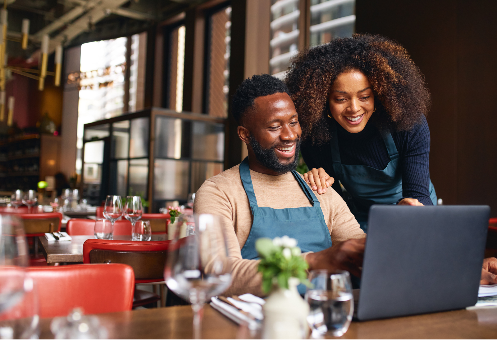 Happy Business Owners on Laptop
